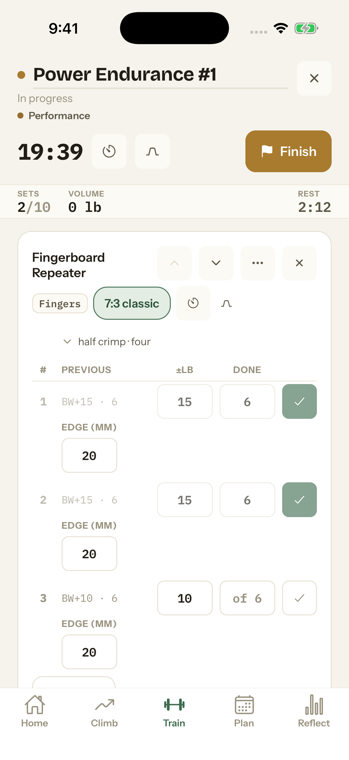 The phone app during a workout: a fingerboard repeater with two of three sets ticked, last time's numbers beside each row, and the edge size under each set
